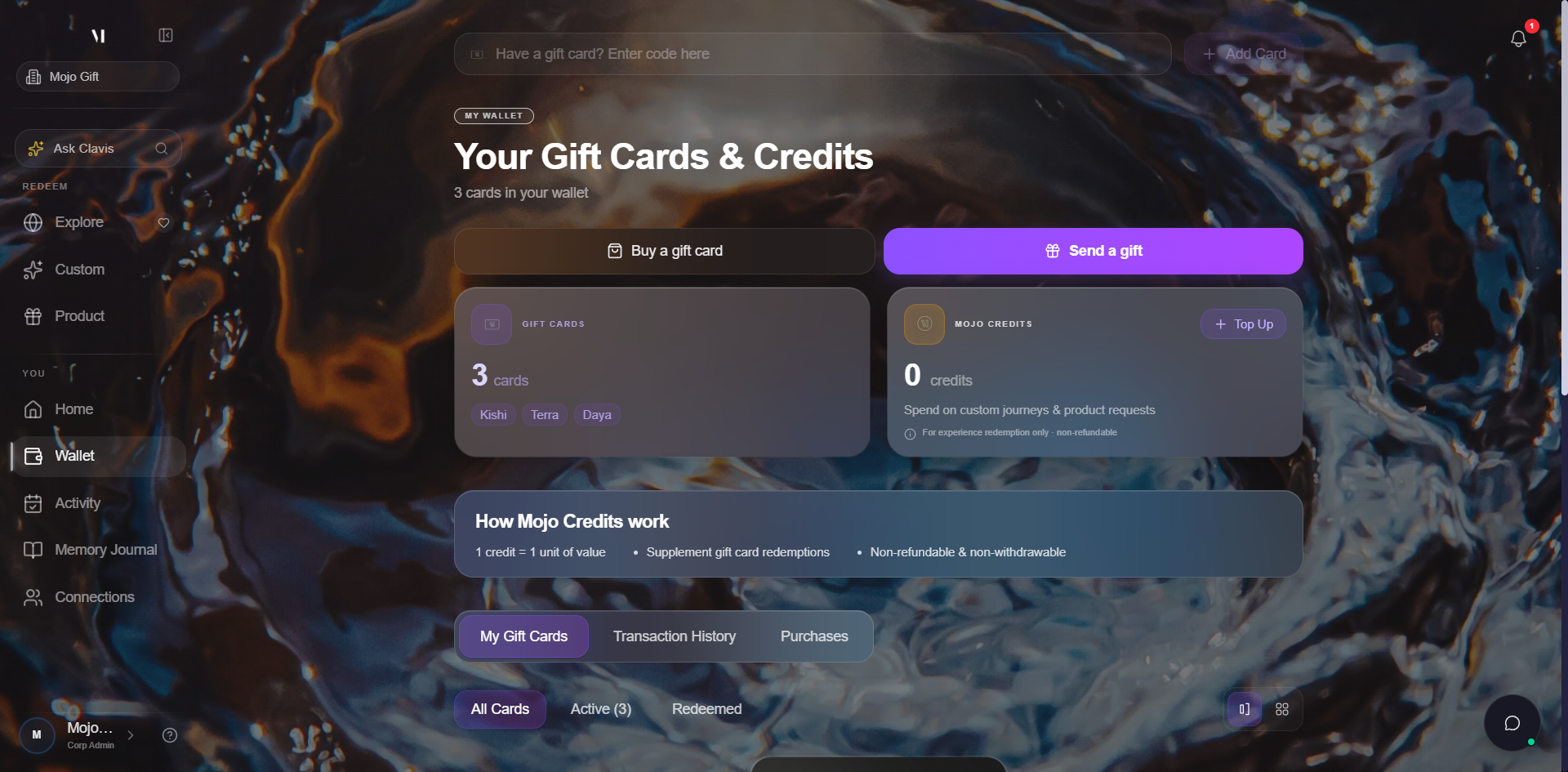 Wallet page. Top bar has a Have a gift card? Enter code here input and an Add Card button. Heading reads MY WALLET, Your Gift Cards & Credits, with subtitle 3 cards in your wallet. Two action buttons: Buy a gift card and Send a gift. Below, two summary cards: GIFT CARDS showing 3 cards with chips Exora, Lunara, Terra; and MOJO CREDITS showing 0 credits with a Top Up button, subtitle Spend on custom journeys & product requests, footer For experience redemption only, non-refundable. Below the cards, an info bar titled How Mojo Credits work. At the bottom, tabs for My Gift Cards, Transaction History, Purchases, with sub-tabs All Cards, Active (3), Redeemed.
