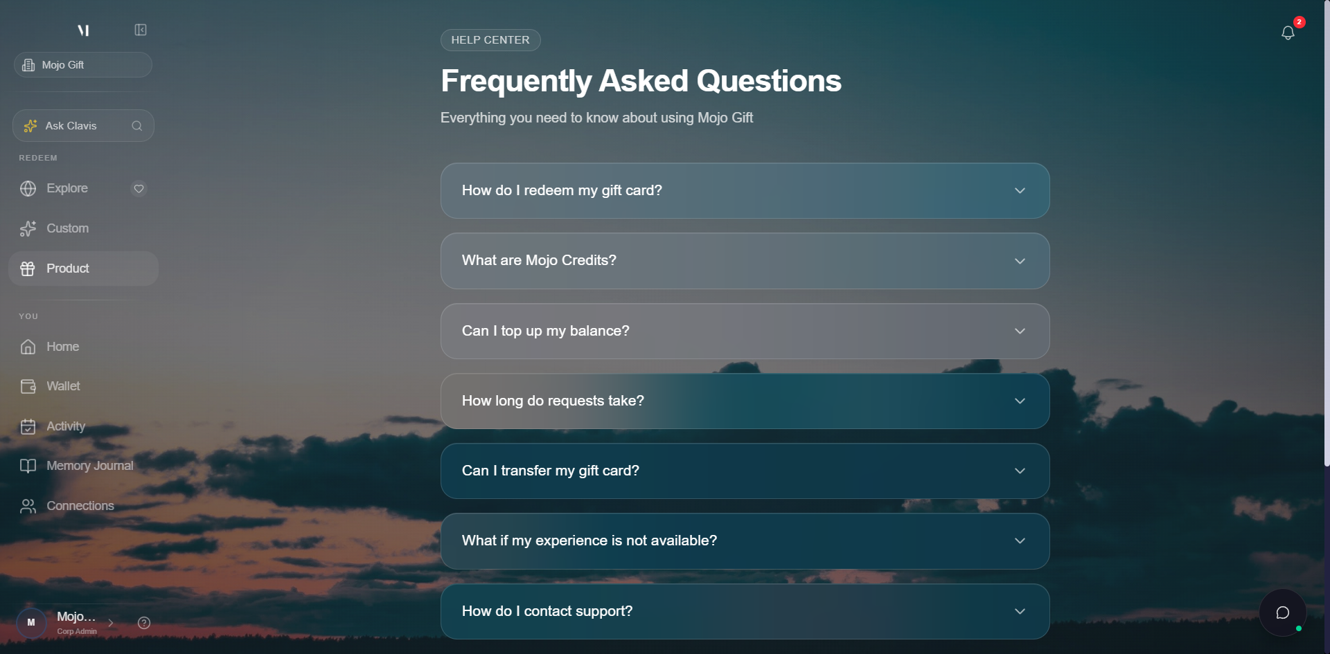 Help Center page. Header reads Frequently Asked Questions with subtitle Everything you need to know about using Mojo Gift. Below, a list of collapsed FAQ entries: How do I redeem my gift card?, What are Mojo Credits?, Can I top up my balance?, How long do requests take?, Can I transfer my gift card?, What if my experience is not available?, How do I contact support?. At the bottom, a Still have questions? card with the email address support@mojogift.com.