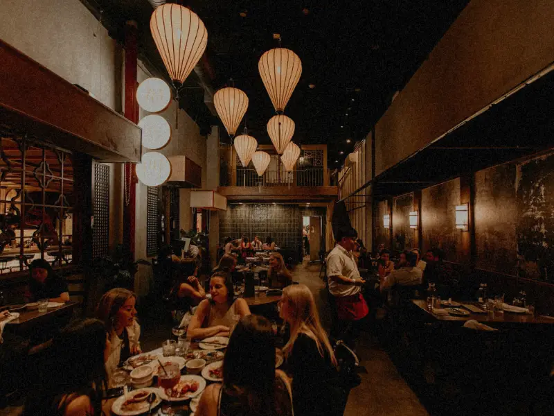 International team members across multiple countries accessing equal experience gift options through borderless digital recognition platform.